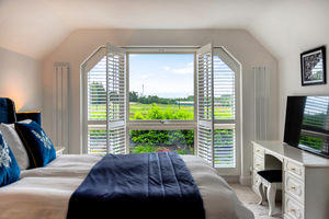 Bedroom One- click for photo gallery